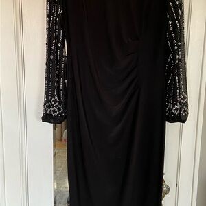 Beautiful Black Dress, Mid-calf length, Marina size 14.